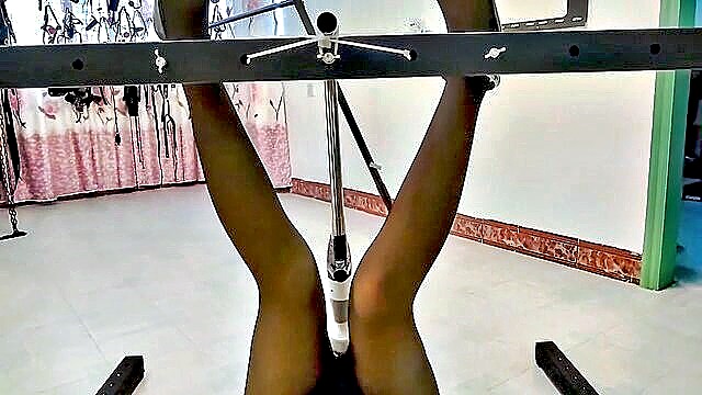Xxx - sensual asian babe in leather and metal bdsm bondage
