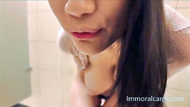 asian teen squirts during public bathroom solo session : webcam