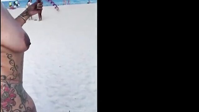 tatted big booty babe struts her stuff on the beach : ama