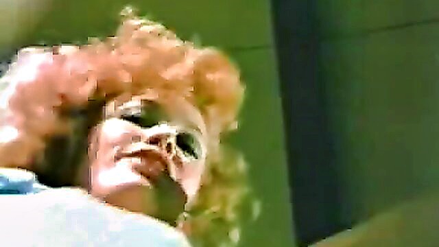 red hair beauty gets a big black cock for a profit in this retro porn video : Color Climax