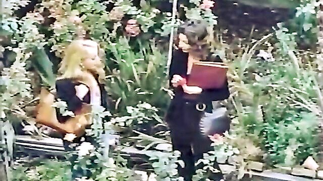 two hot babes pleasure each other with their hairy pussies with a dildo : The Classic Porn