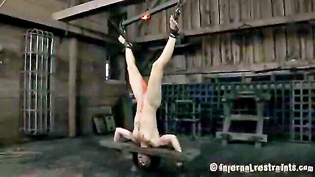 brunette slave gets waxed and tormented with pleasure : Infernal Restraints