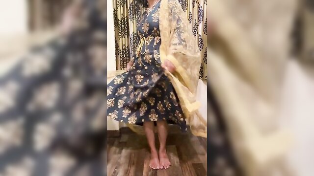 mature beauty stripping down and teasing in traditional outfit : Milf