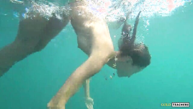 GoldTeachers - amateur homemake video of a nude model swimming in the sea in russia GoldTeachers