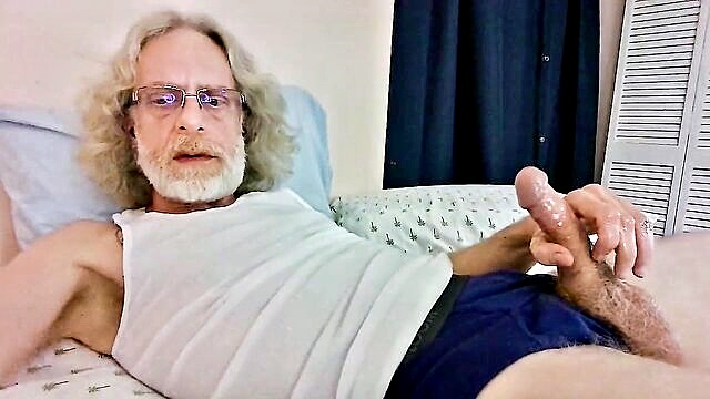 old gay man jerks off while dressed in blue underpants watch as he masturbates his large penis and culminates in a spectacular ejaculation : Jerkin Dad 14