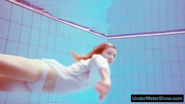 redhead in white dress and bikini : lesch_bernice