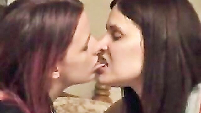 two women engage in passionate kissing with extended tongues for those who enjoy tongue play : zxzxzx13