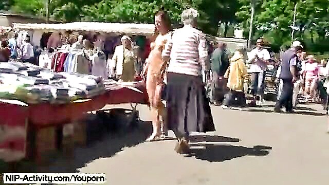 a german lassie enjoys public street playtime : mills_jena