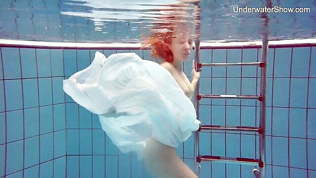 russian teen swims in the pool without a swimsuit : Underwater Show