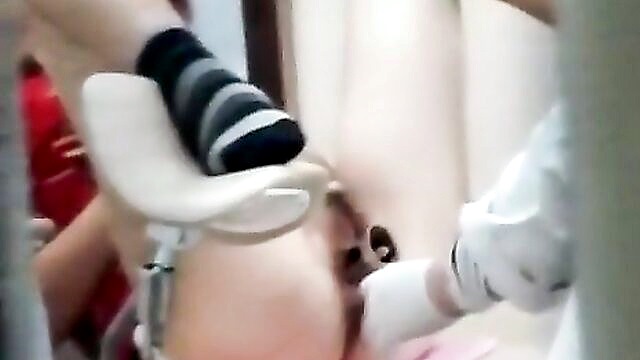 the voyeuristic footage of a gynecological examination includes the intimate details of the womans genitalia as she is positioned in stirrups spreads her legs wide and holds her breath as the speculum is inserted : allen_gottlieb